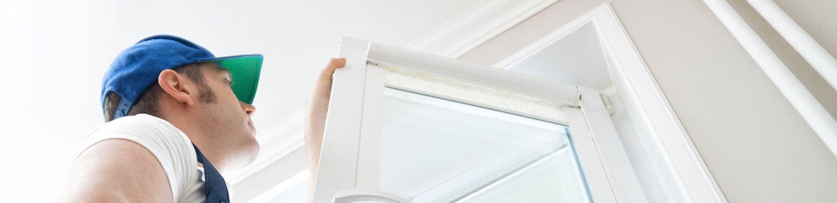 A worker installs a new window.