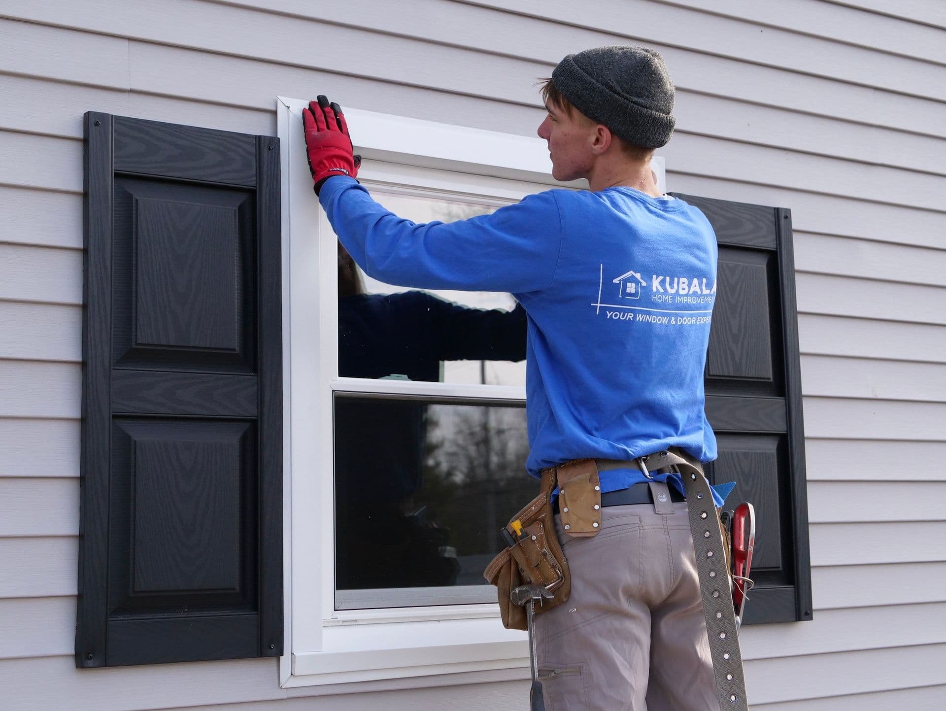 Kubala Windows & Doors installer working.